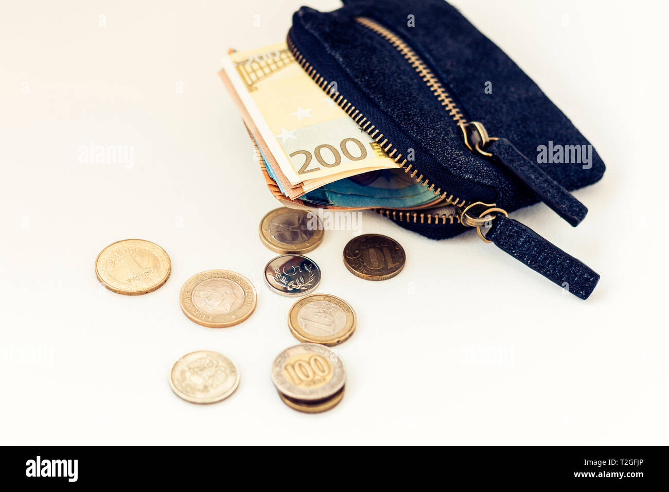 Black suede leather wallet isolated on white background with euro and ...