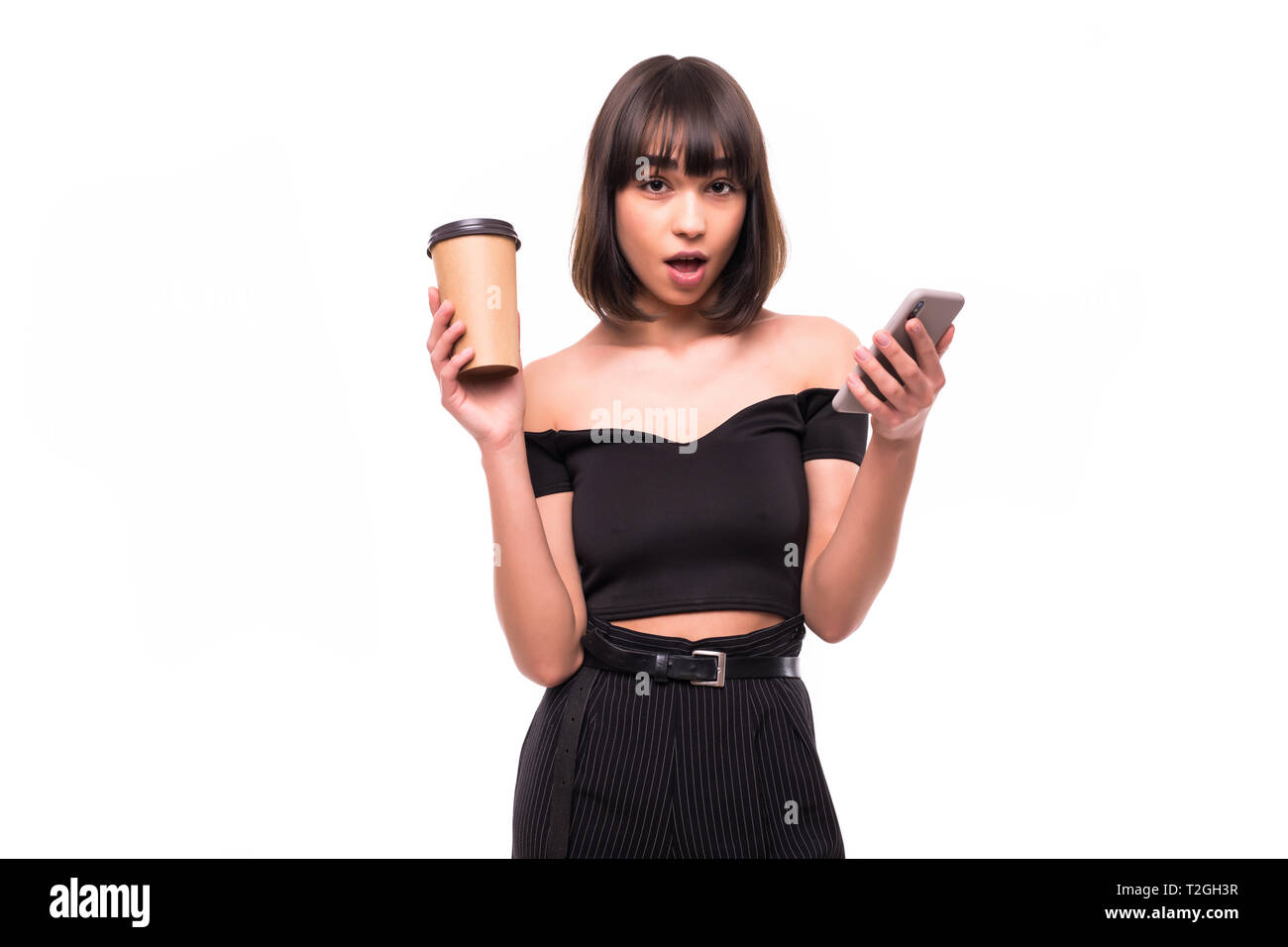 Image of shocked young business woman posing isolated over grey wall ...
