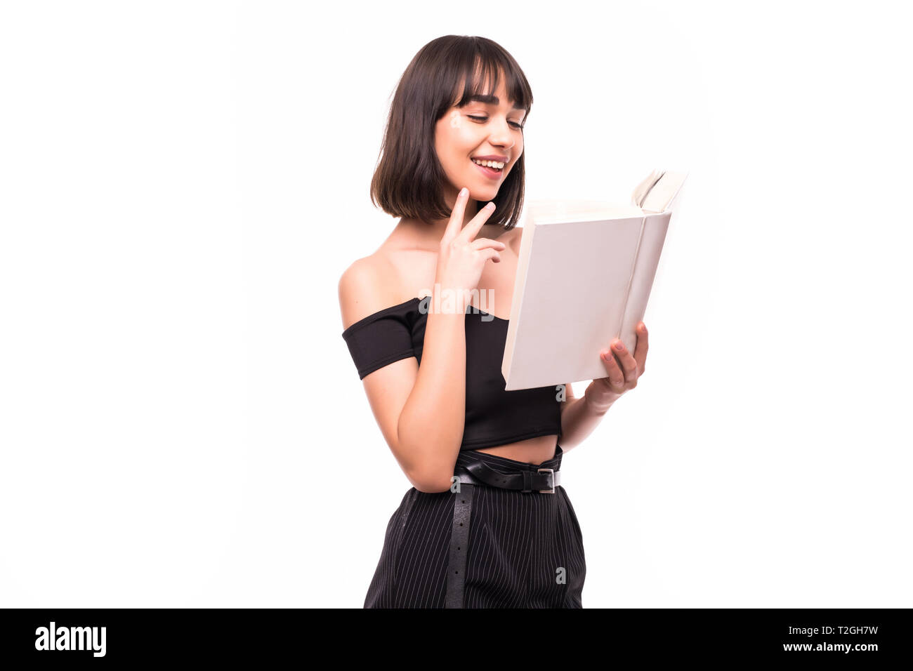 young girl with book isolated on a white background Stock Photo - Alamy