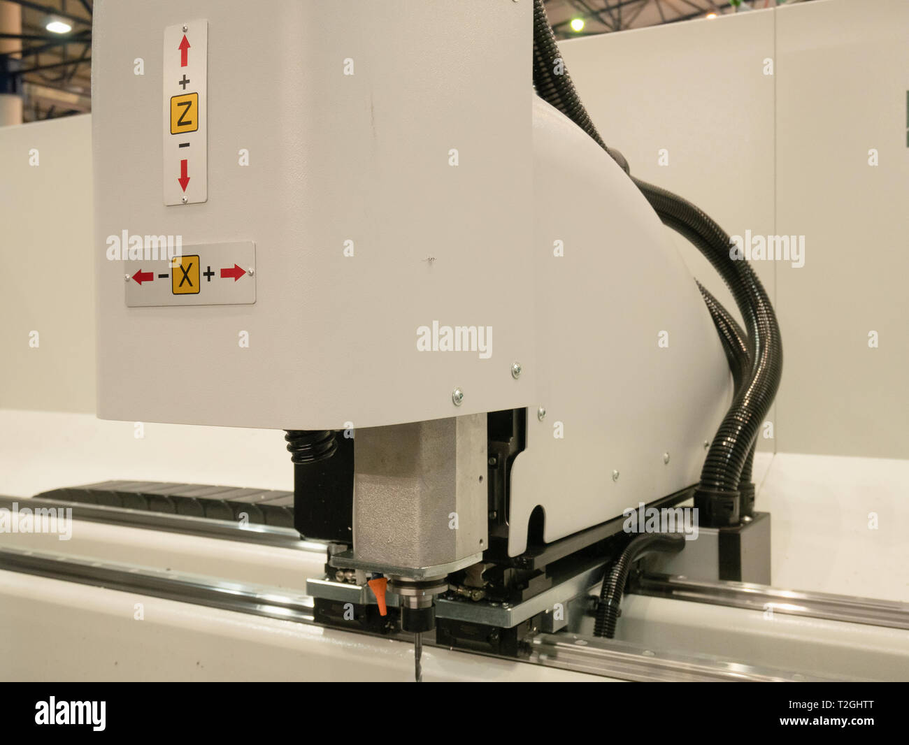 automated industrial programmable laser cutting engraving machine. closeup side view image