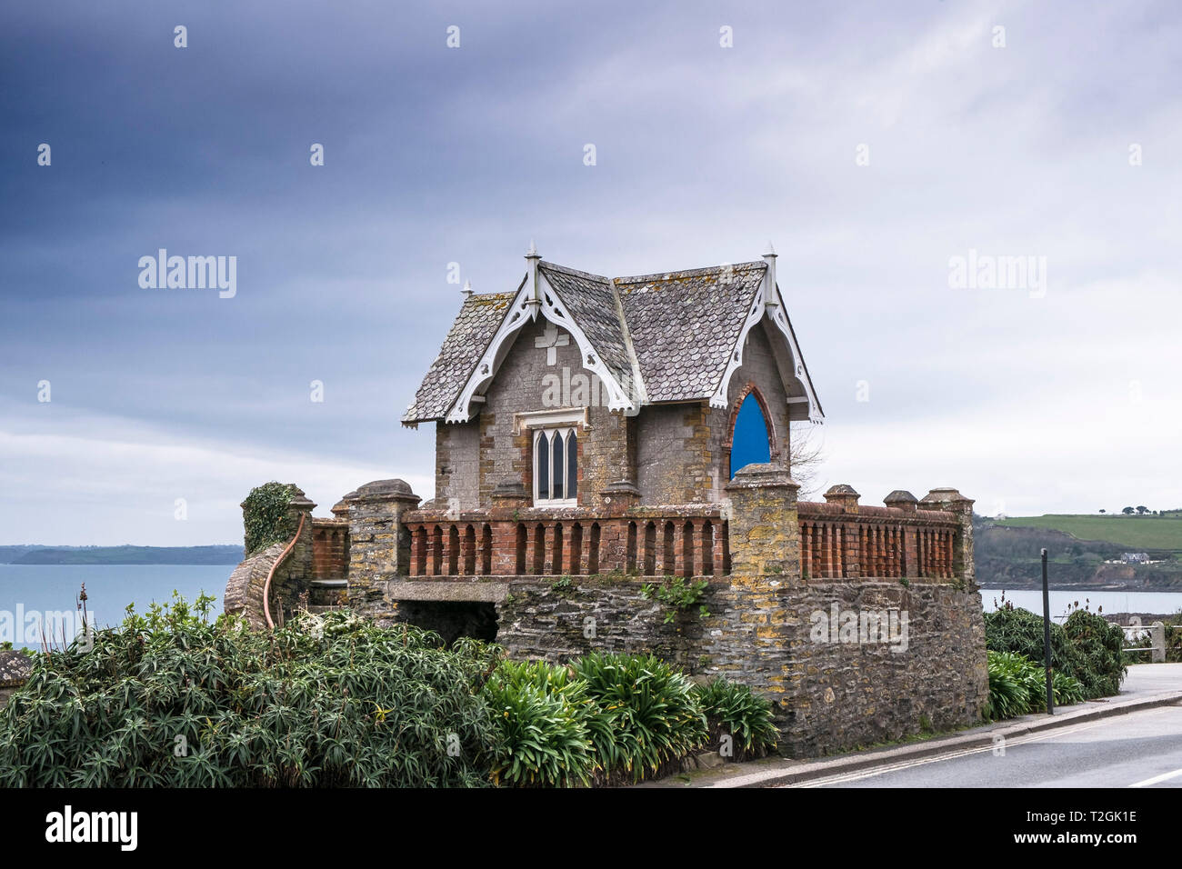 A Victorian Folly known as Parson Coope’s Chapel overlooking Gyllyngvase Beach in Falmouth in Cornwall. Stock Photo