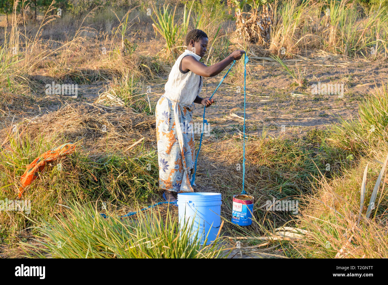 Woman drawing water from well hires stock photography and images Alamy
