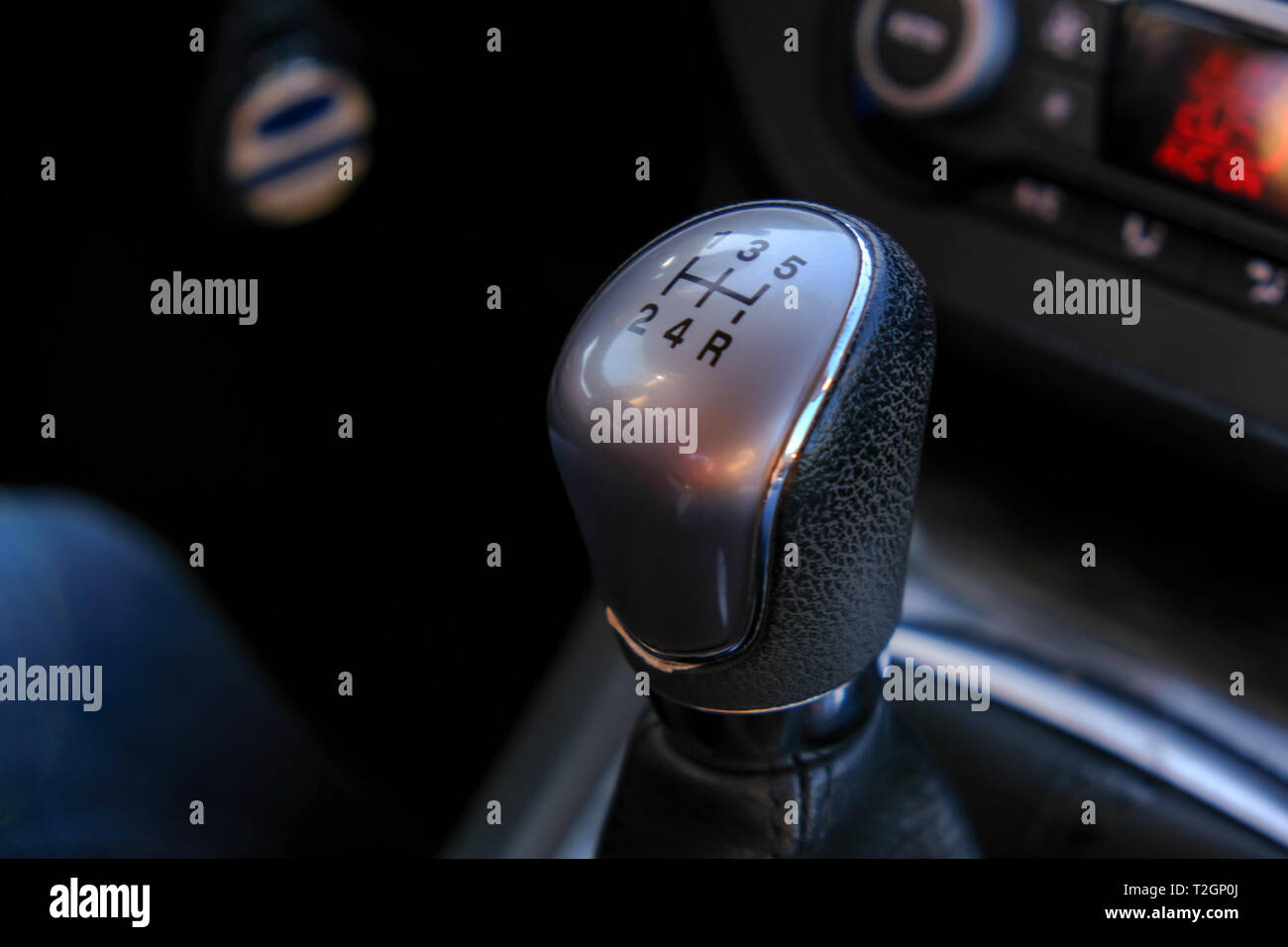 Closeup of manual gear shifter on manual transmission, 5 speed gear