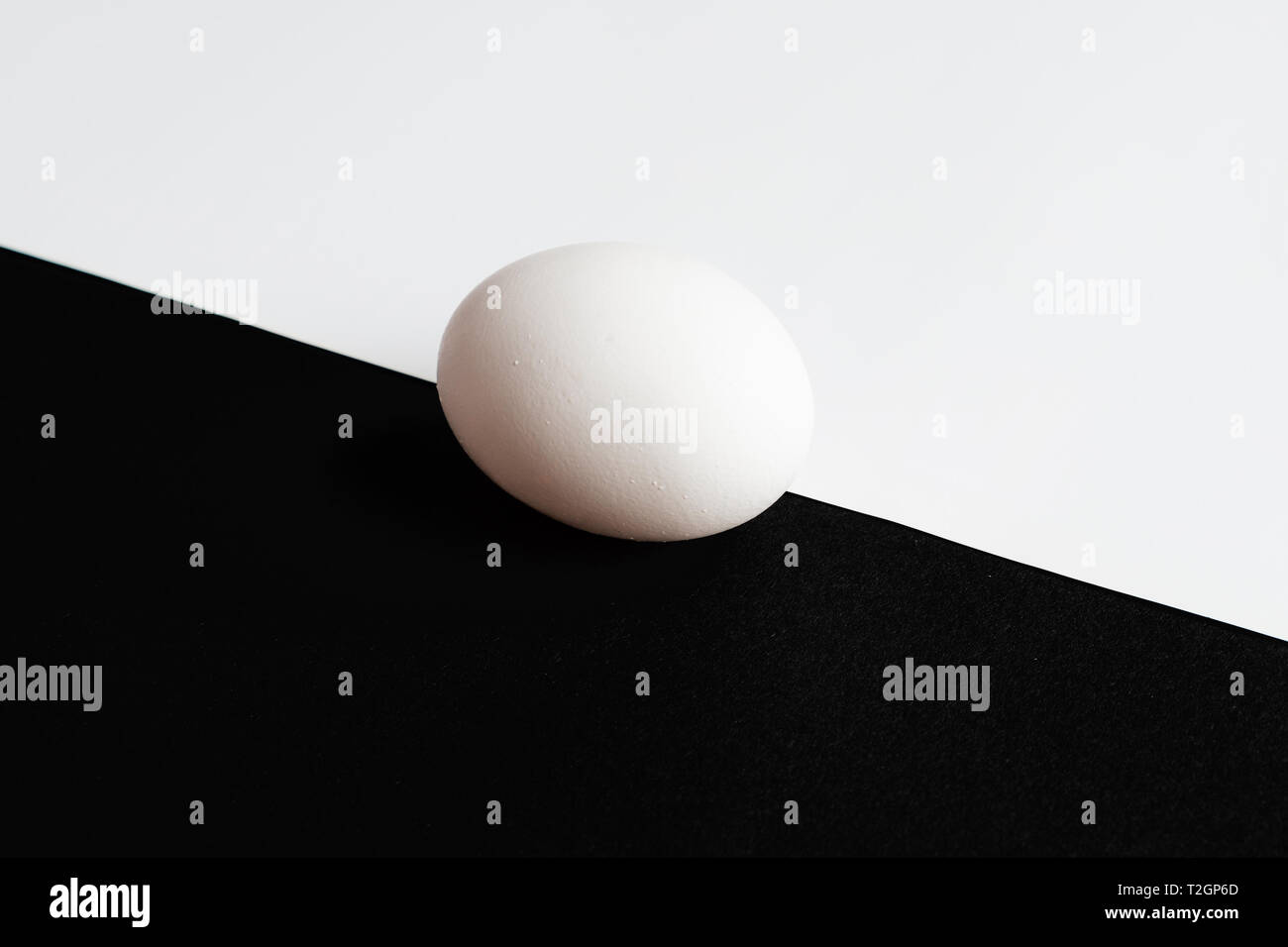 one egg on the black background Stock Photo - Alamy
