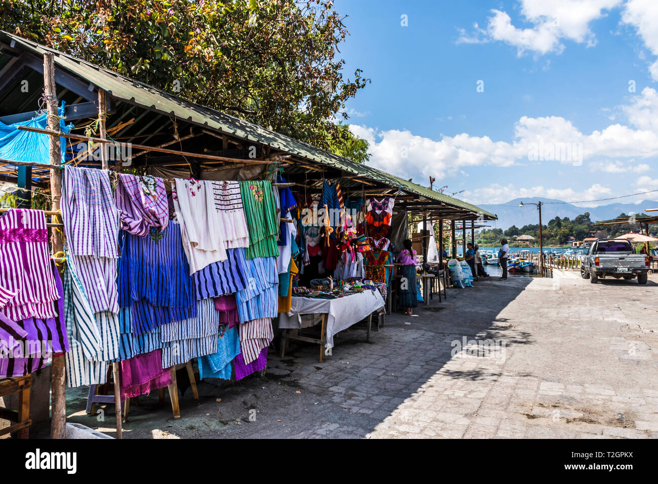 Santiago Atitlan, Lake Atitlan, Guatemala - March 8, 2019: Stall selling Mayan textiles & souvenirs in largest Mayan town on Lake Atitlan in Guatemala Stock Photo