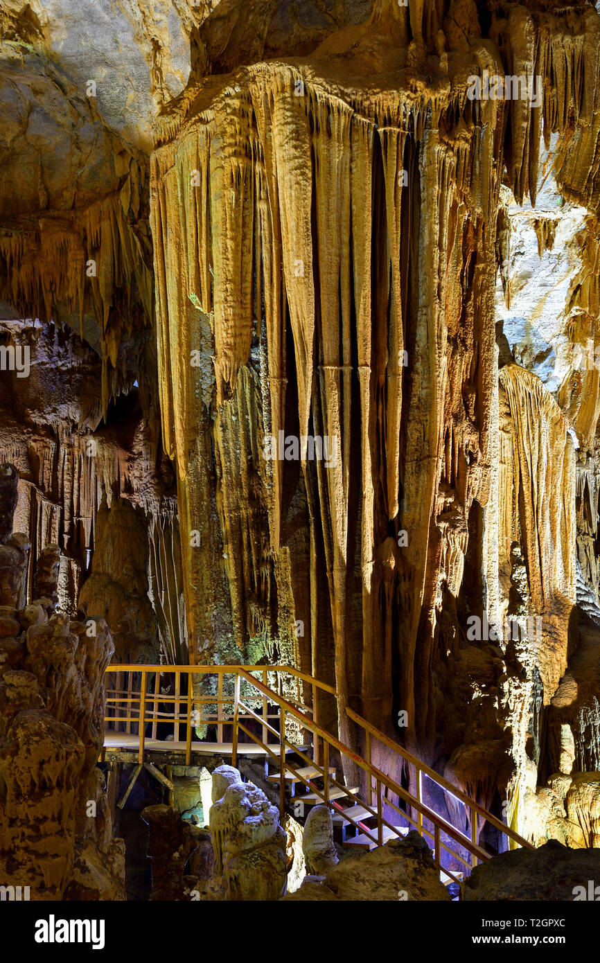 Amazing geological forms in Tien Son near Phong Nha, Vietnam. Limestone cave full of stalactites and stalagmites. Stock Photo