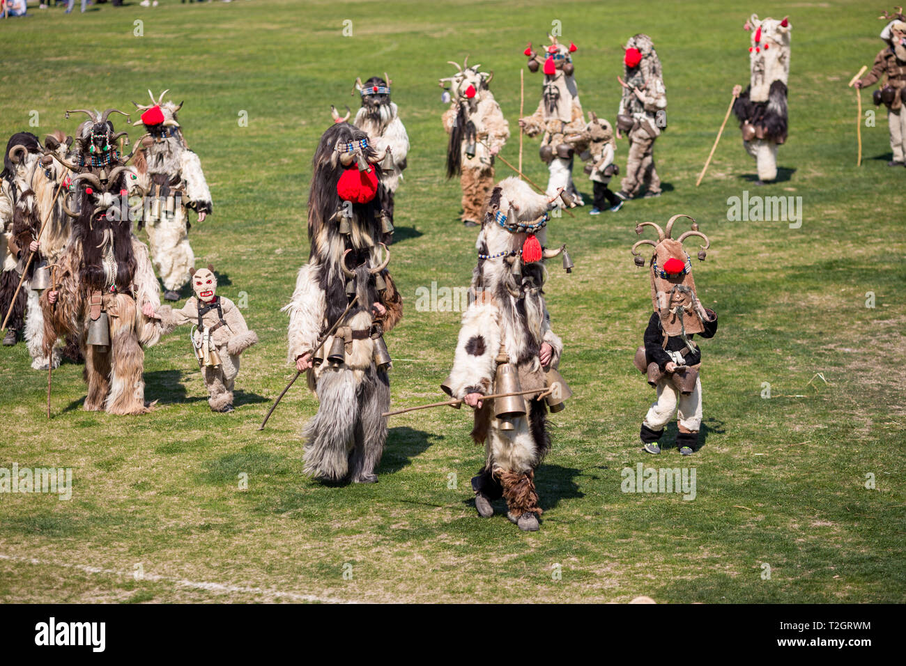 VARVARA, BULGARIA - MARCH 24, 2019: Moment from National Festival Dervish Varvara presents traditions of Bulgarian Kuker Games. Performers present the Stock Photo