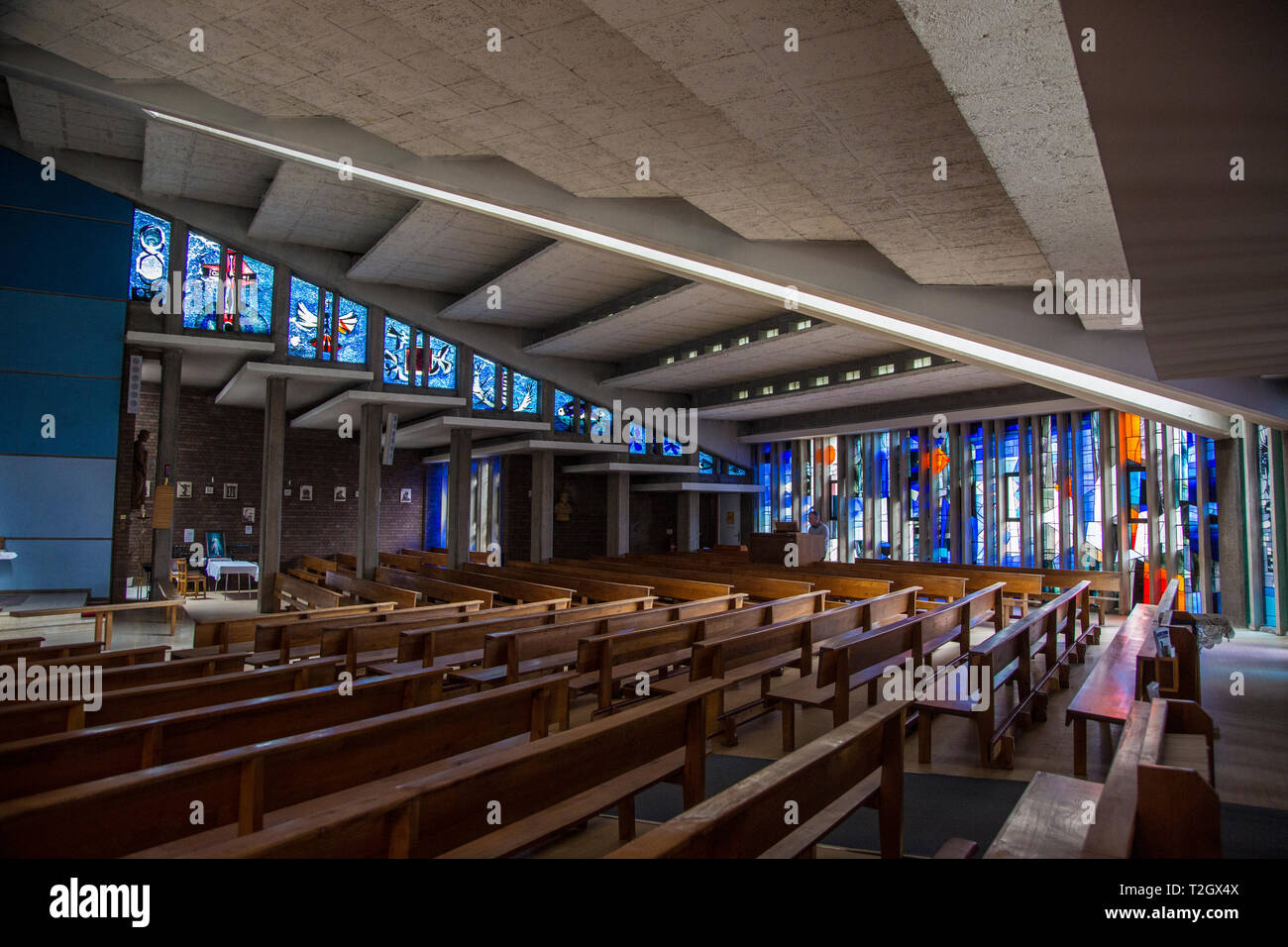 Stained glass windows in a modern church in Birmingham, blue and orange stained glass with