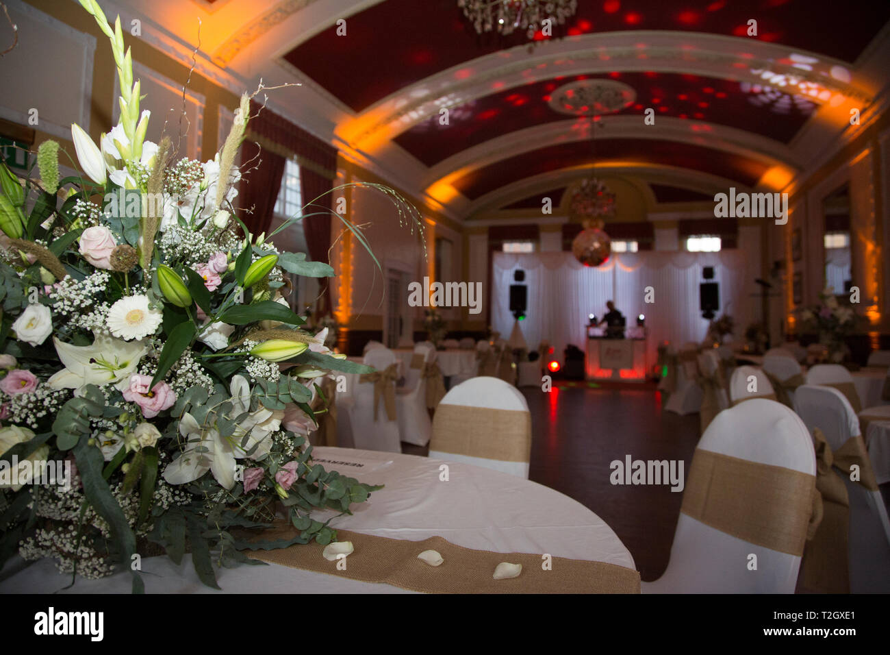 Wedding Reception room, all lit up ready for the first dance, with pretty  lights, large room with a dome shaped roof,ready for the wedding  celebration Stock Photo - Alamy