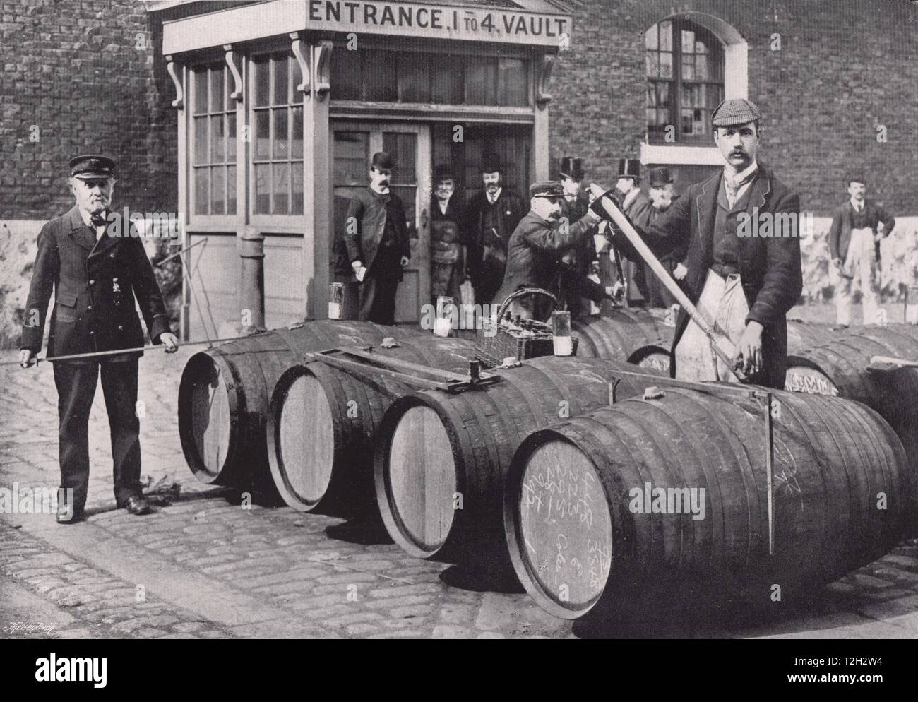 The London Docks the gaugers at work Stock Photo Alamy