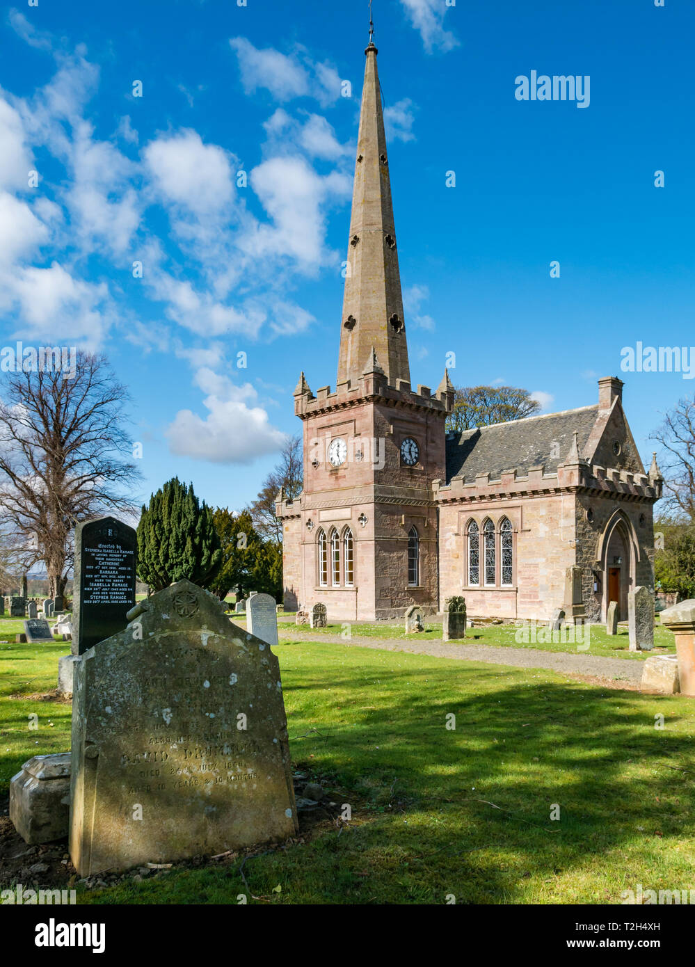 Picturesque conservation village, Saltoun Parish Church with old gravestones in churchyard, East Saltoun, East Lothian, Scotland, UK Stock Photo