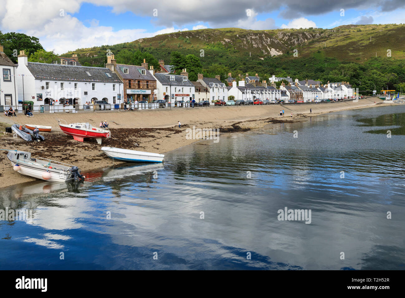 Cottages and boats by Loch Broom in Ullapool, Scotland, Europe Stock Photo