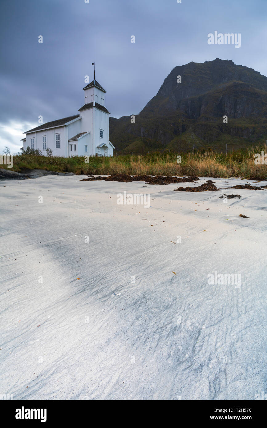 Church by beach on Gimsoya, Lofoten Islands, Norway, Europe Stock Photo