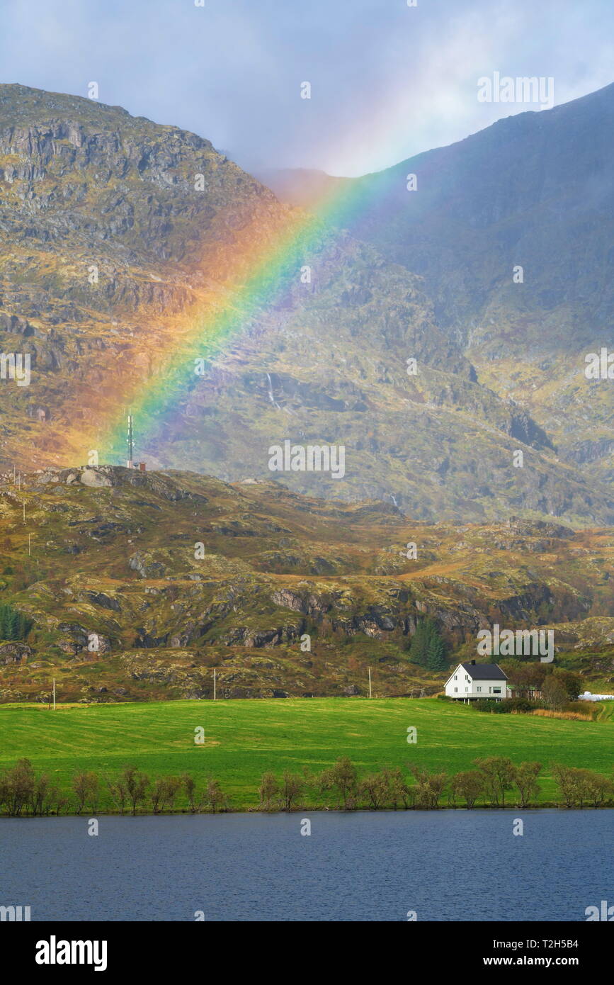 Rainbow over mountain in Leknes, Lofoten Islands, Norway, Europe Stock Photo