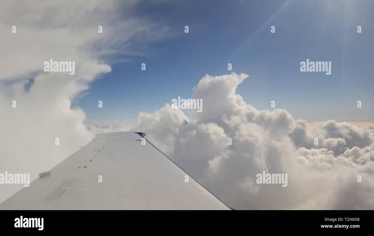 Airplane flying high in evening hi-res stock photography and images - Alamy