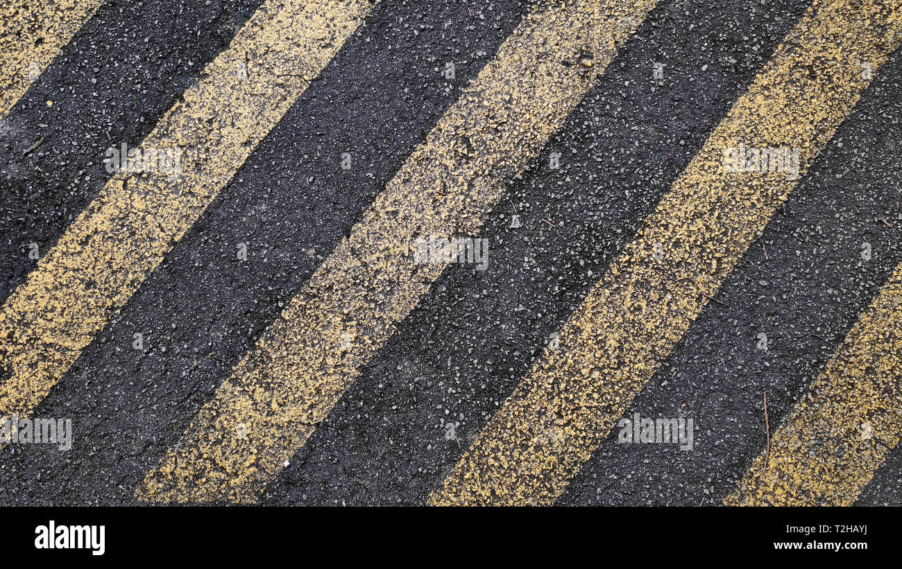 asphalt texture with faded lines asphalt texture with faded lines