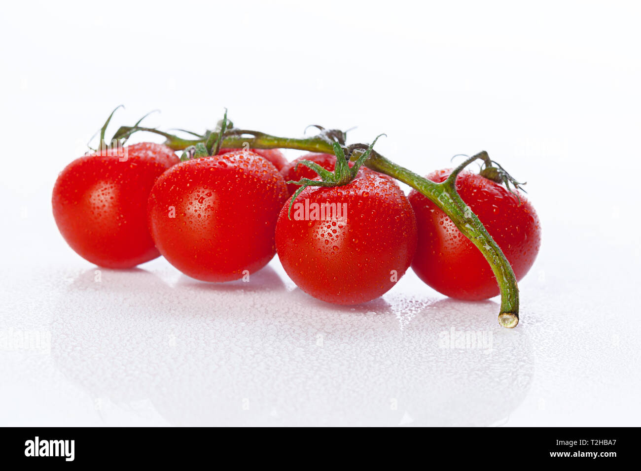 Fresh tomato isolated on white background Stock Photo - Alamy