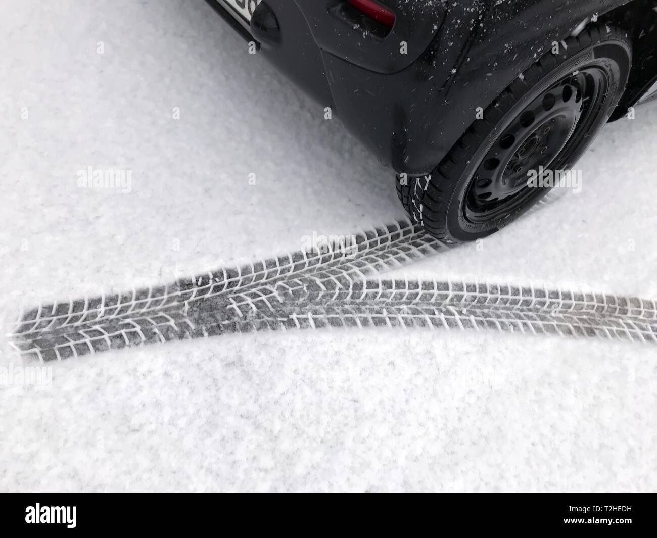 Tyre tracks in snow, winter tyres, Germany Stock Photo