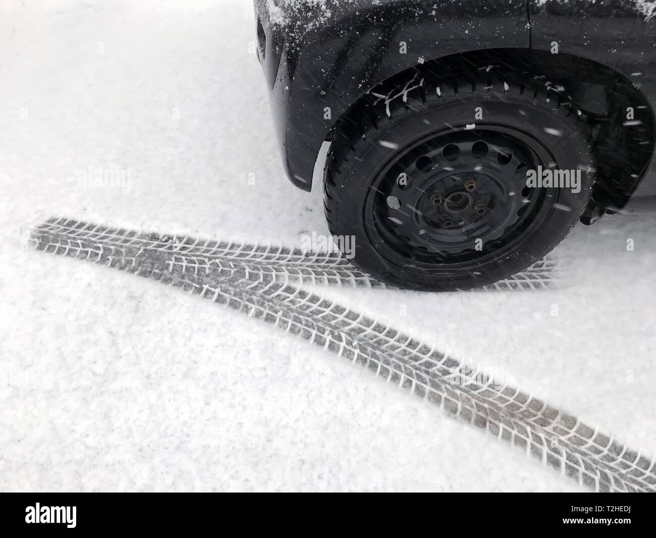 Tyre tracks in snow, winter tyres, Germany Stock Photo