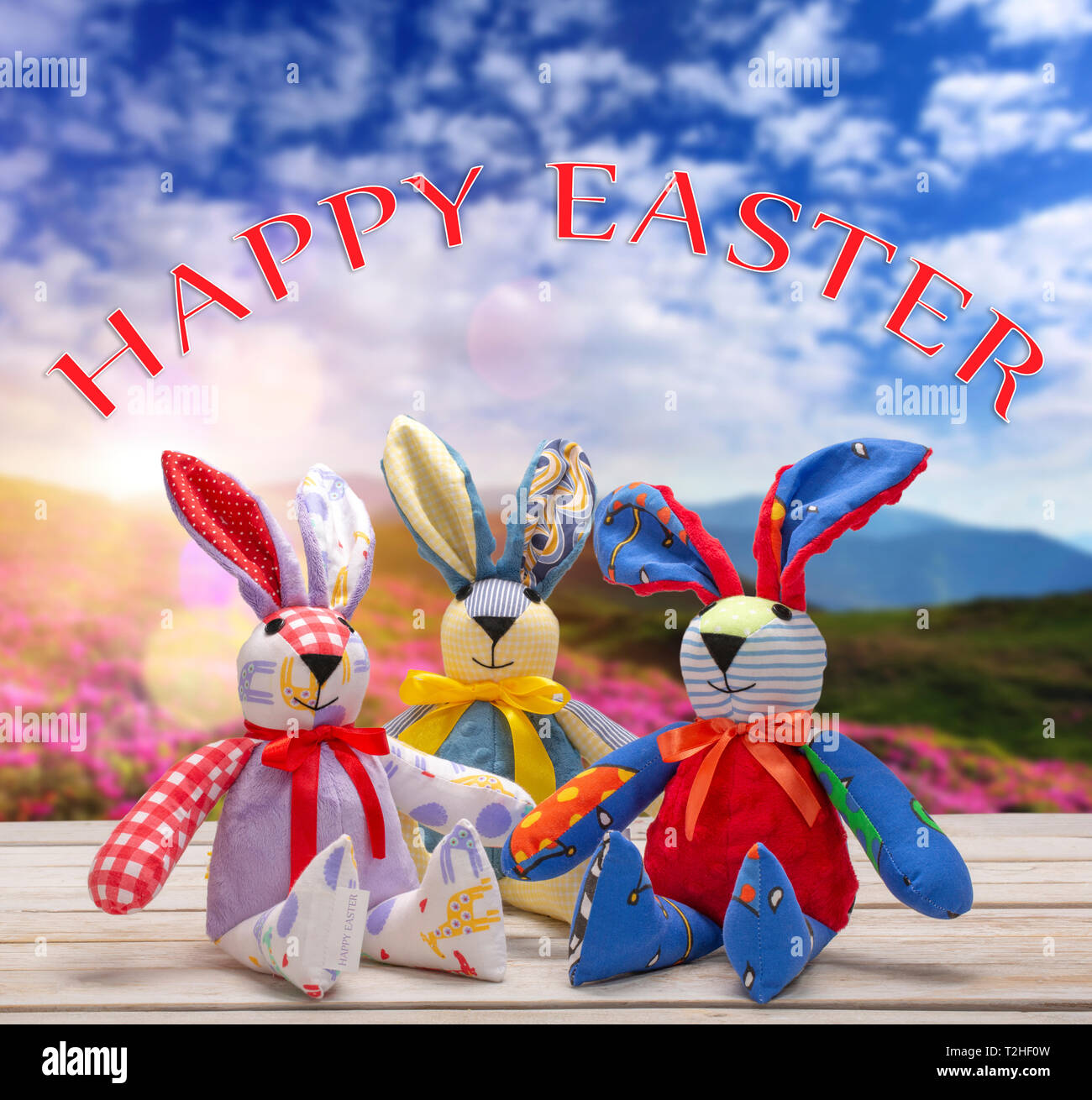 Easter bunnies with happy easter text. Easter holiday concept. Stock Photo