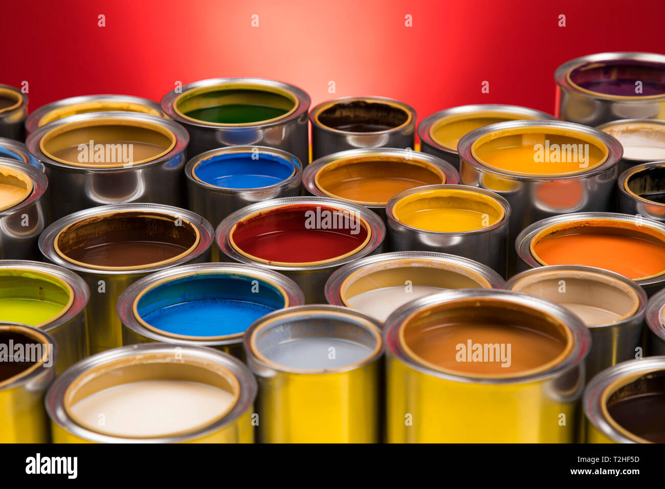 Group of Brush, tin metal cans with color paint Stock Photo - Alamy