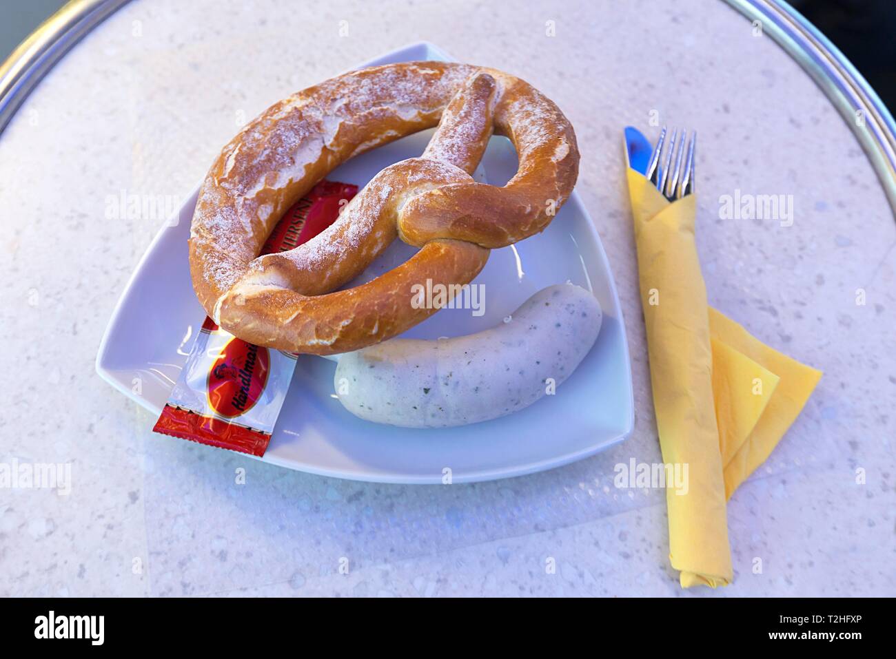 Weisswurst with fresh pretzel, Franconia, Bavaria, Germany Stock Photo