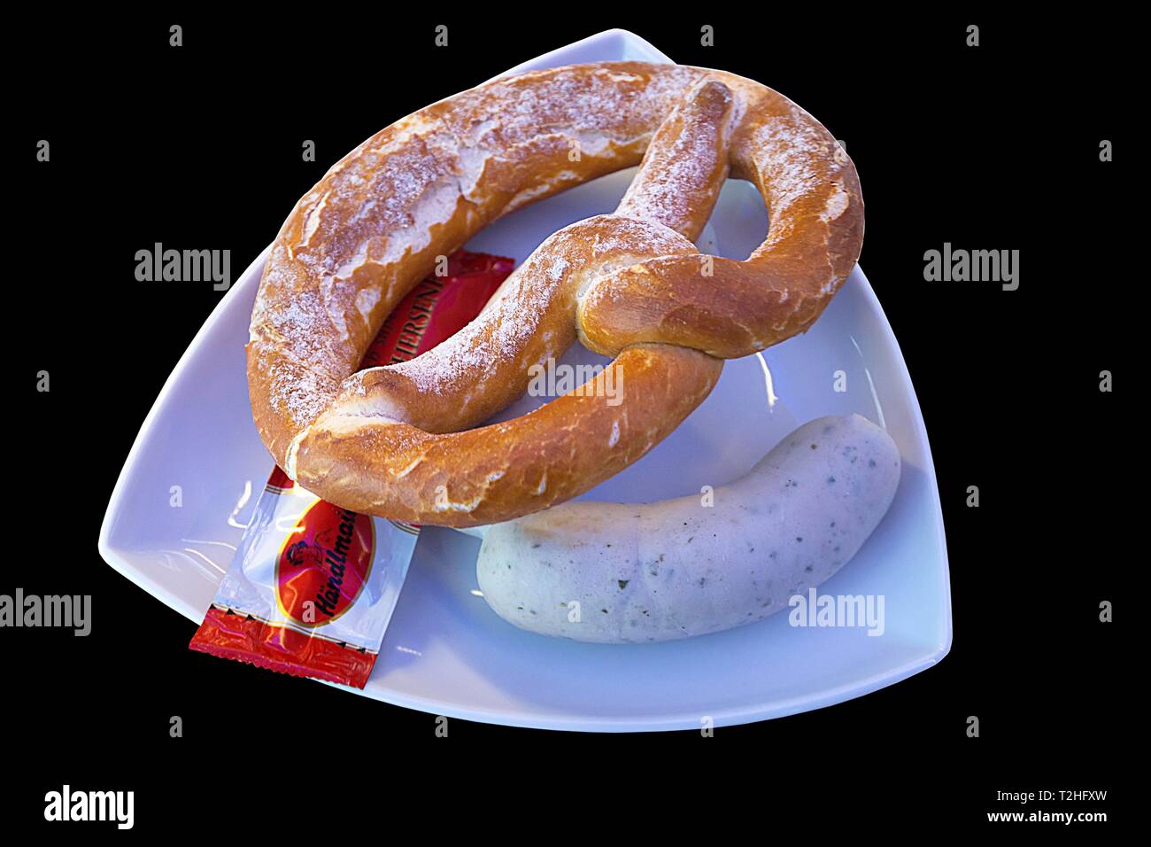 Weisswurst with fresh pretzel, Franconia, Bavaria, Germany Stock Photo