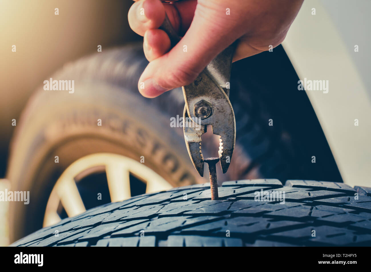 Hand pulling for Removing a Nail in the Tire,Flat tire Fixing and