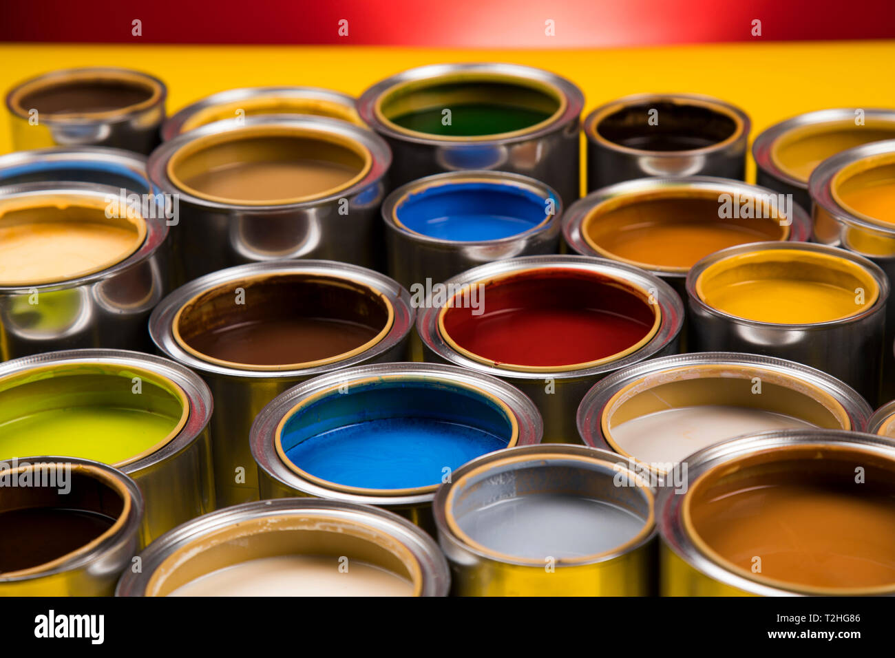 Group of Brush, tin metal cans with color paint Stock Photo - Alamy