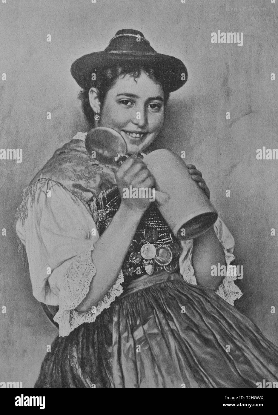 Bavarian woman wearing traditional dress and holding a beer mug, Bavaria, 1899, historical illustration, Germany Stock Photo