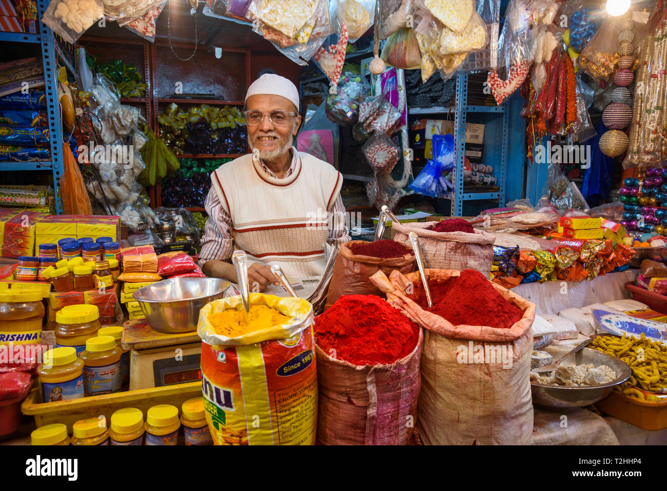 Vendor at stall in Krishnarajendra Market in Bangalore, Karnataka, India, Asia Stock Photo