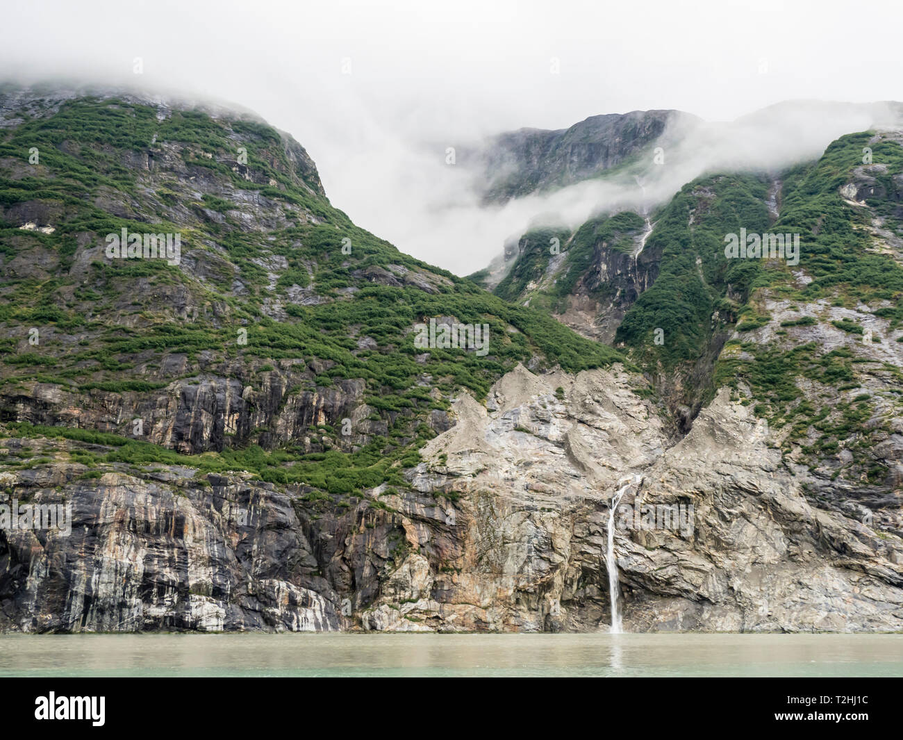 Ice melt waterfall in Tracy Arm-Fords Terror Wilderness Area, Southeast Alaska, United States of America Stock Photo