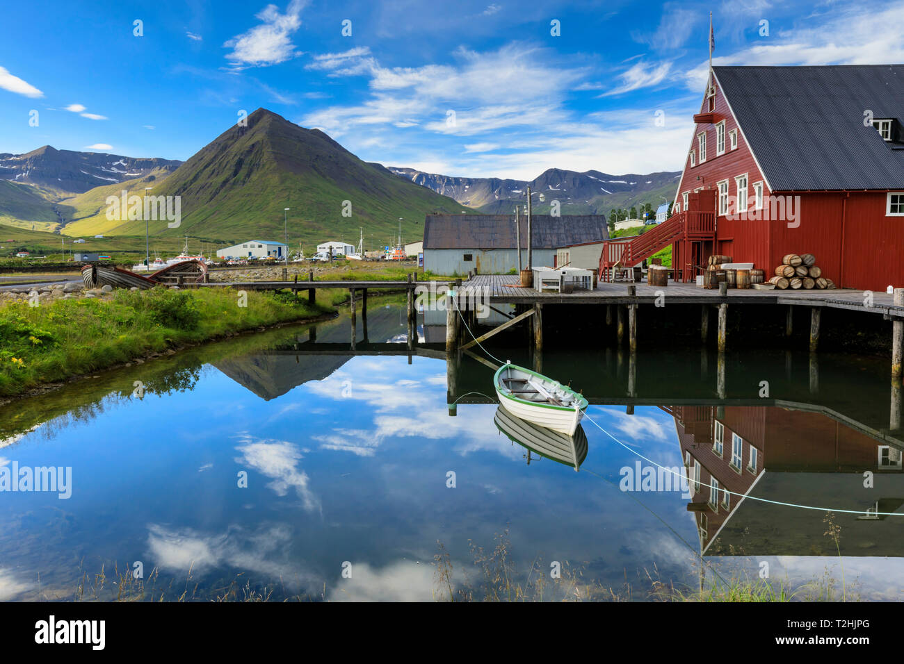 Award-winning Herring Era Museum, fjord scenery, reflections, Siglufjordur, (Siglufjorour), stunning Summer day, North Iceland, Europe Stock Photo