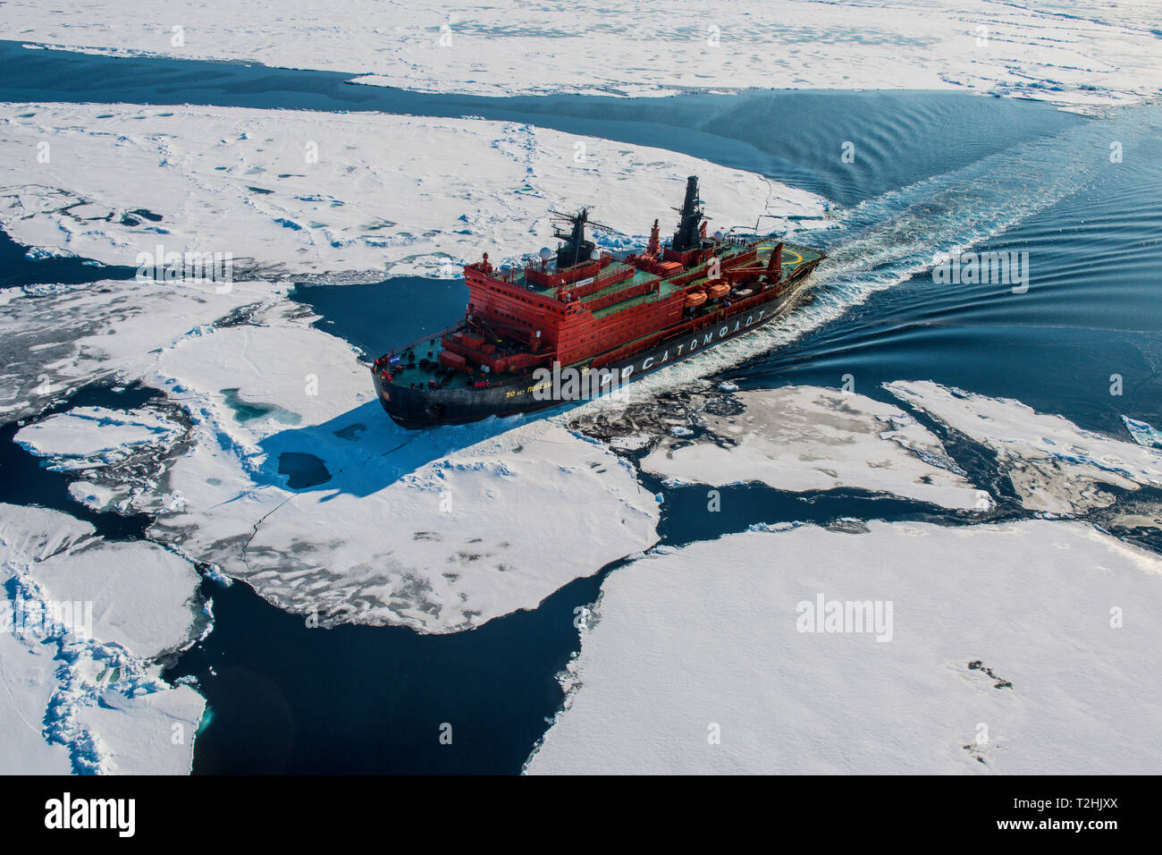 Aerial of the Icebreaker '50 years of victory' on its way to the North Pole, Arctic Stock Photo