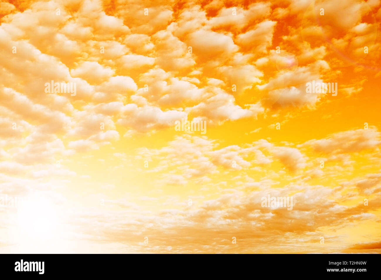 The sun's rays make their way through the clouds Stock Photo - Alamy