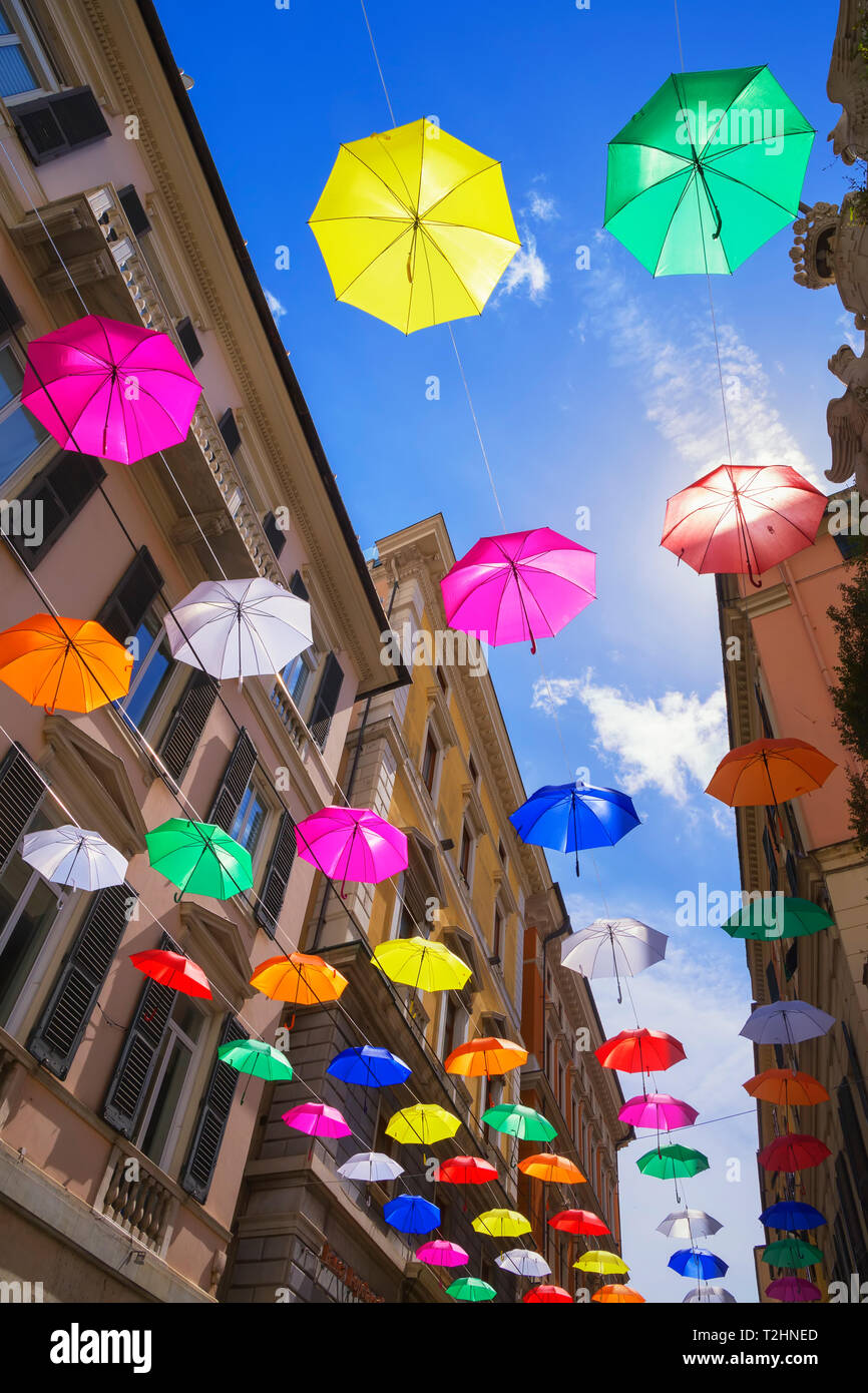 Brightly coloured floating umbrellas, Genoa, Liguria, Italy, Europe Stock Photo