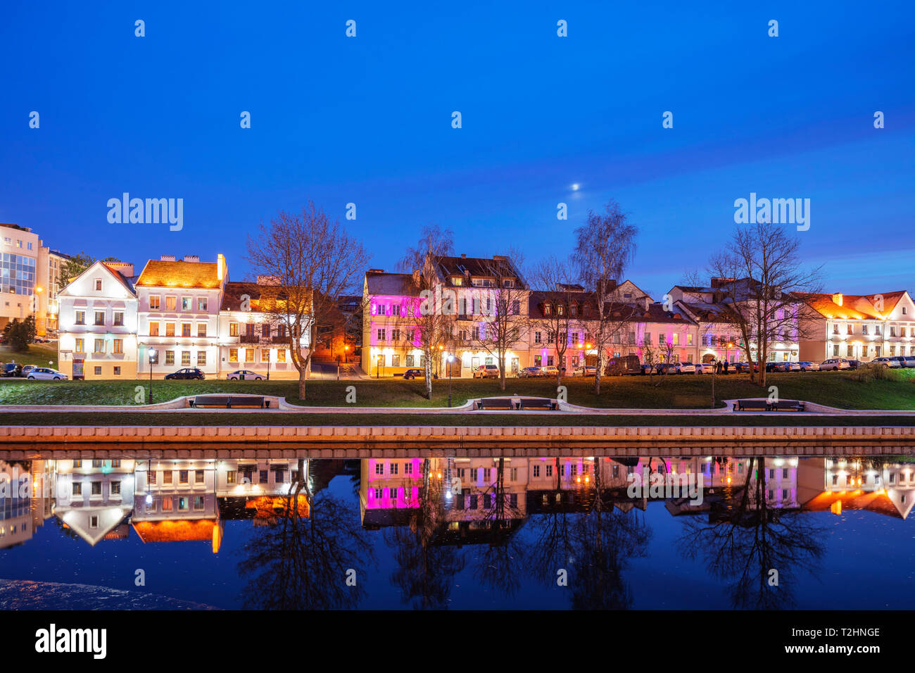 Trinity Suburb reflecting in the Svislach river, Minsk, Belarus, Eastern Europe Stock Photo