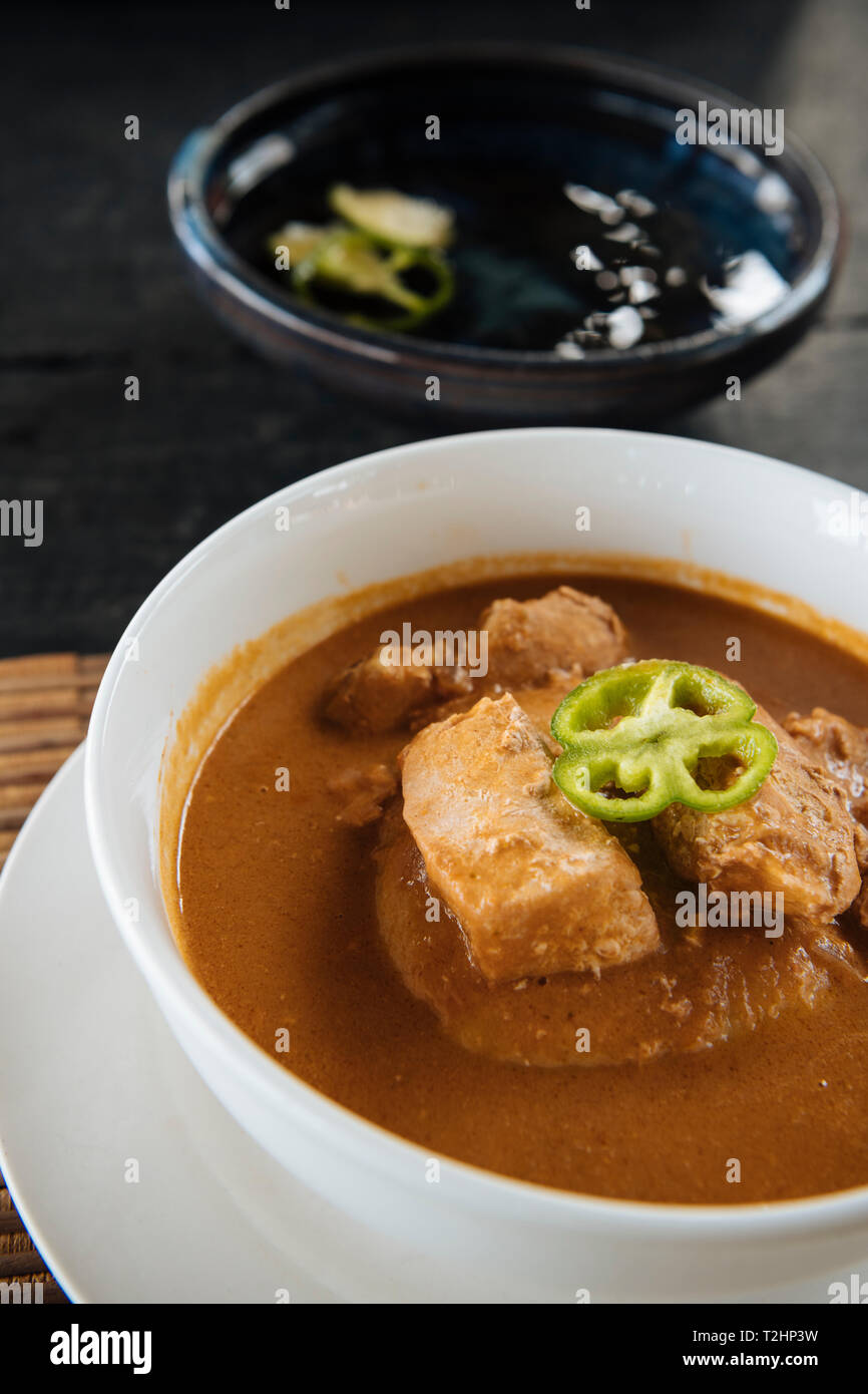 Bowl of traditional Ghanaian dish of fish soup and homemade Fufu, Busua