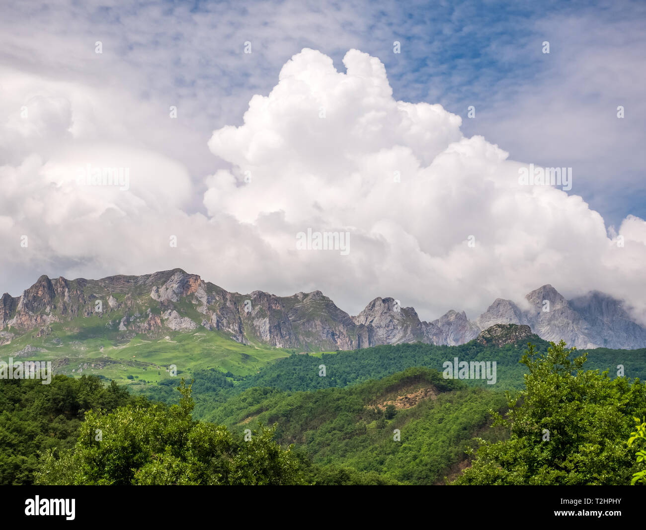 Mountain landscape with blue sky and white clouds Stock Photo - Alamy