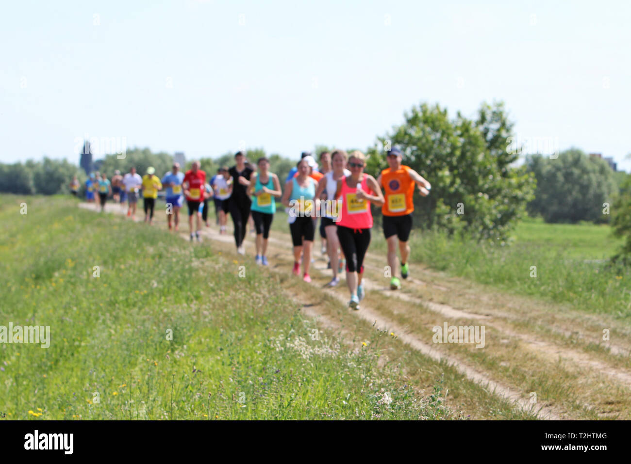 A lot of people on Marathon running in nature, blured motion Stock Photo