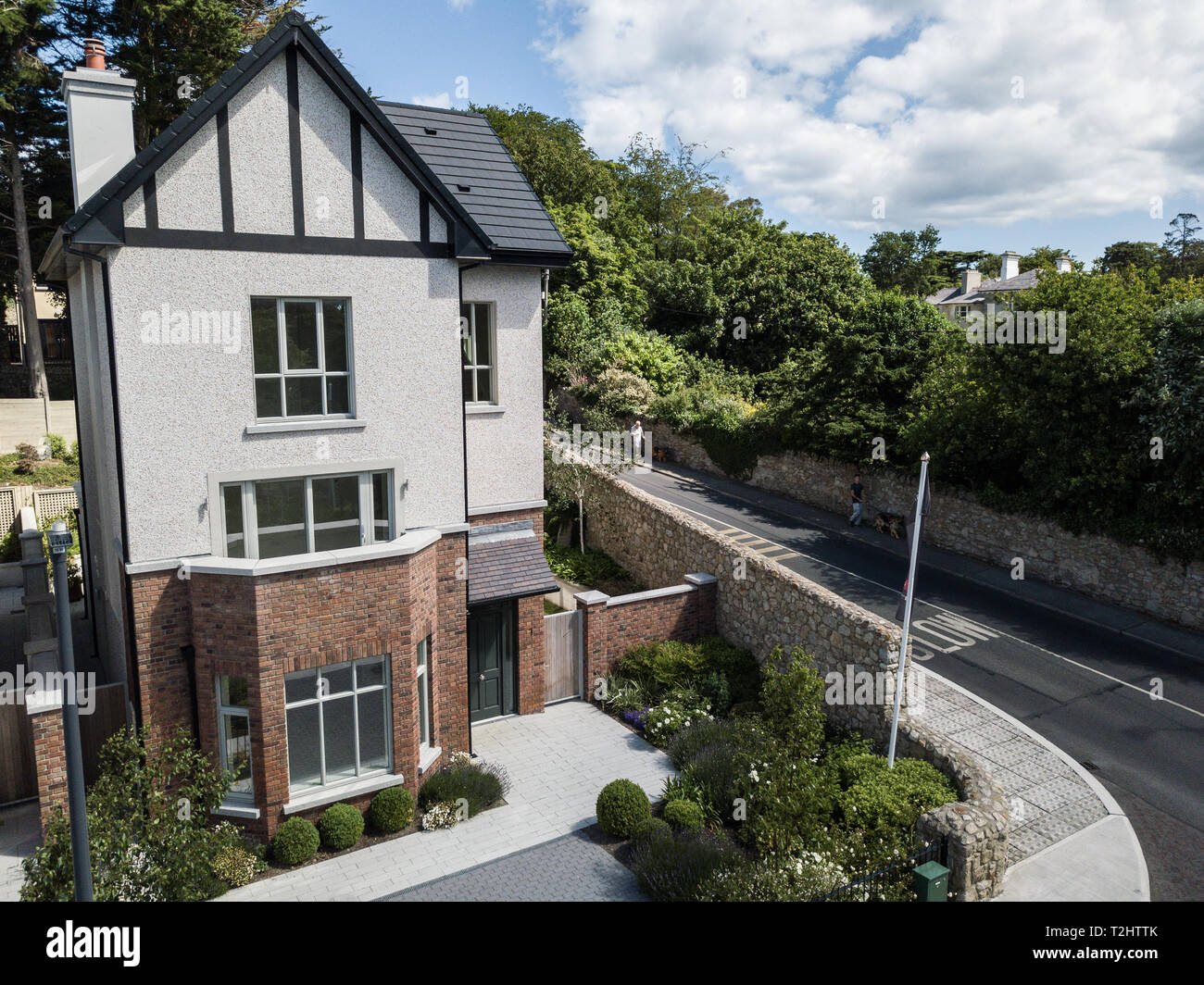 Mock Tudor homes shot by drone, showing the entire housing development and frontal elevation of the luxury homes Stock Photo