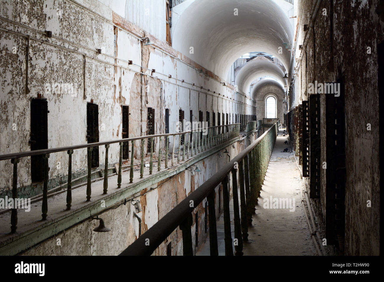 Cell Block of an Old Abandoned Prison - Eastern State Penitentiary Stock Photo