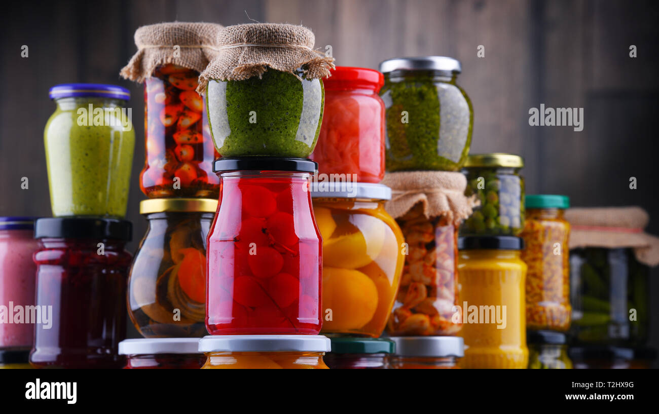 Jars with variety of pickled vegetables and fruits. Preserved food Stock Photo Alamy