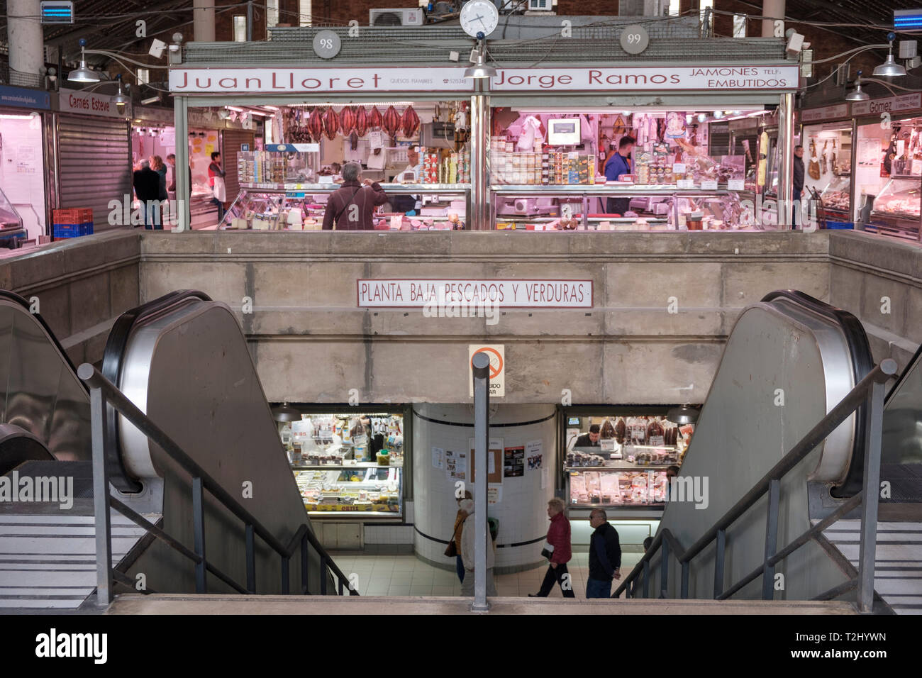 butcher shops on ground level above fish shops in basement in the mercado central, the central market hall in the city of Alicante, Spain Stock Photo