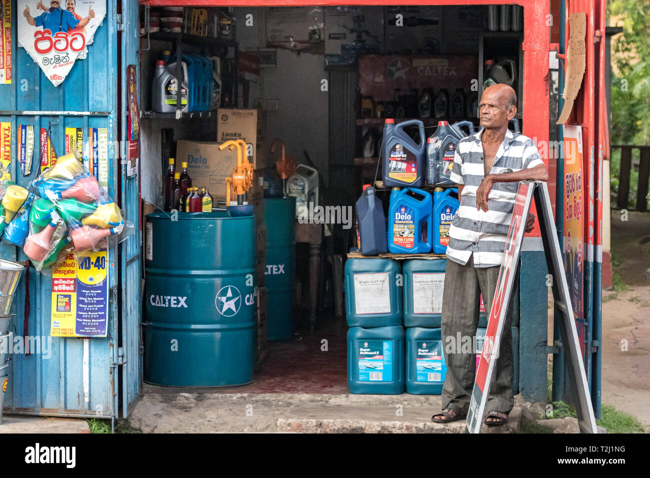 Galle, Sri Lanka February 18th, 2019 A sri lankan engine motor oil supplier, waiting for