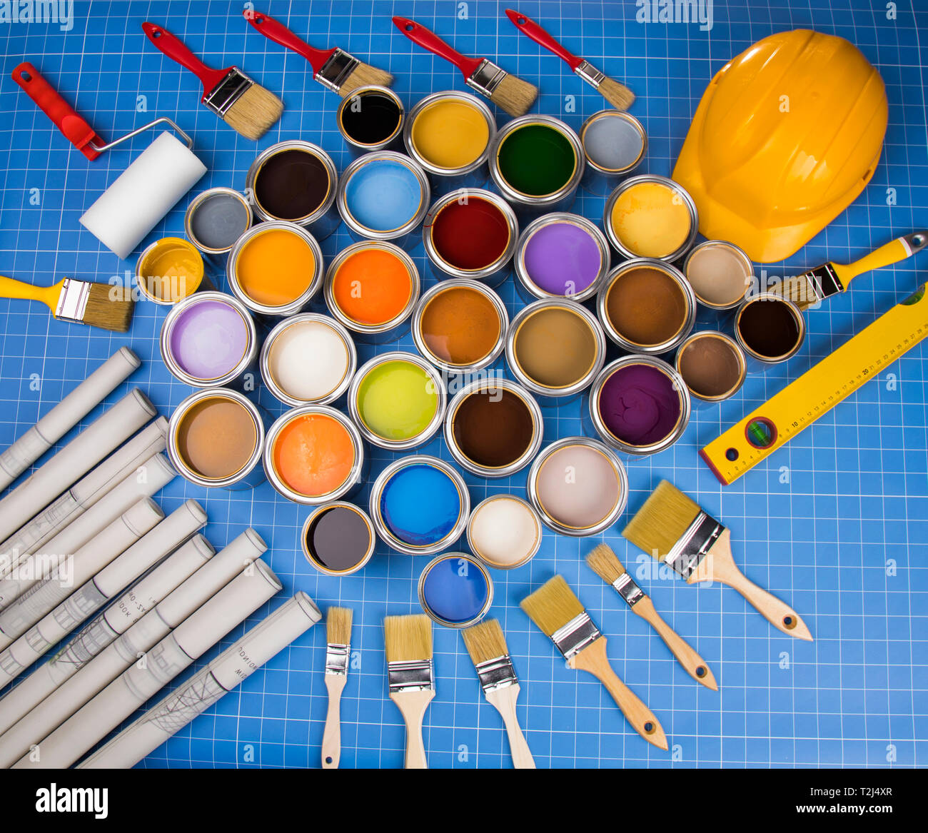 Buckets full of rainbow colored oil paint Stock Photo Alamy