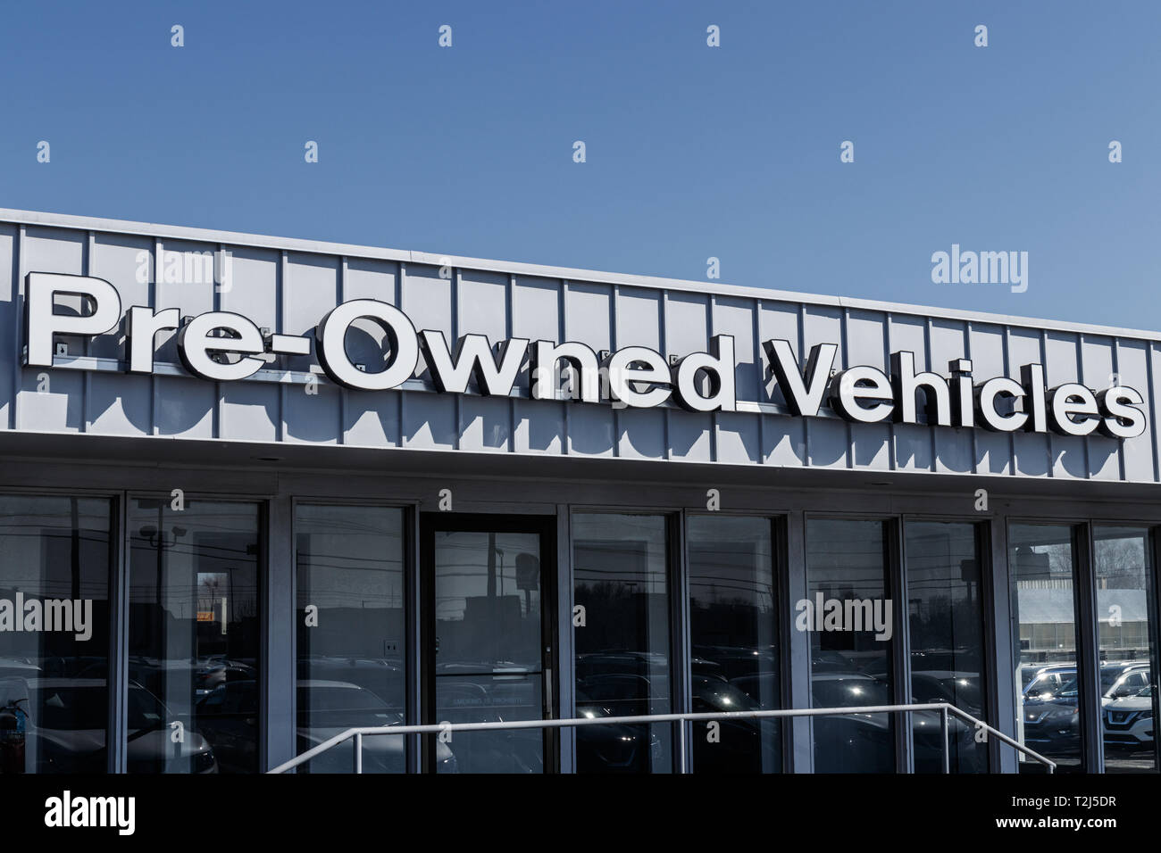 Pre Owned Vehicles sign at a Used Car Dealership Sign Pre Owned IV Stock Photo