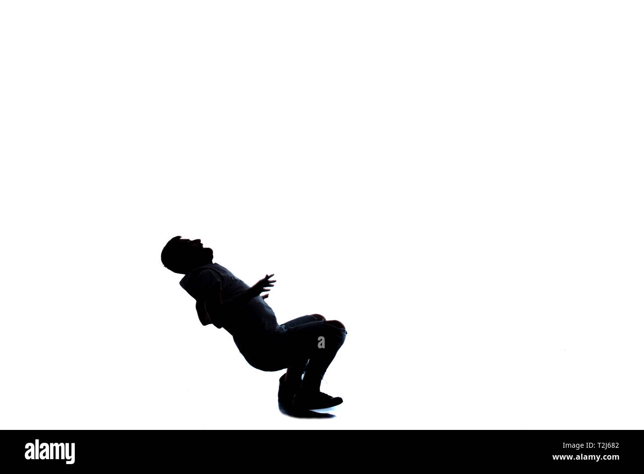 Modern man doing break dance routine Stock Photo