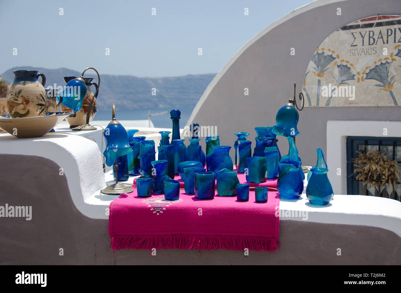 Handmade blue vases on display at a market featuring local artists in Santorini, Greece. Stock Photo