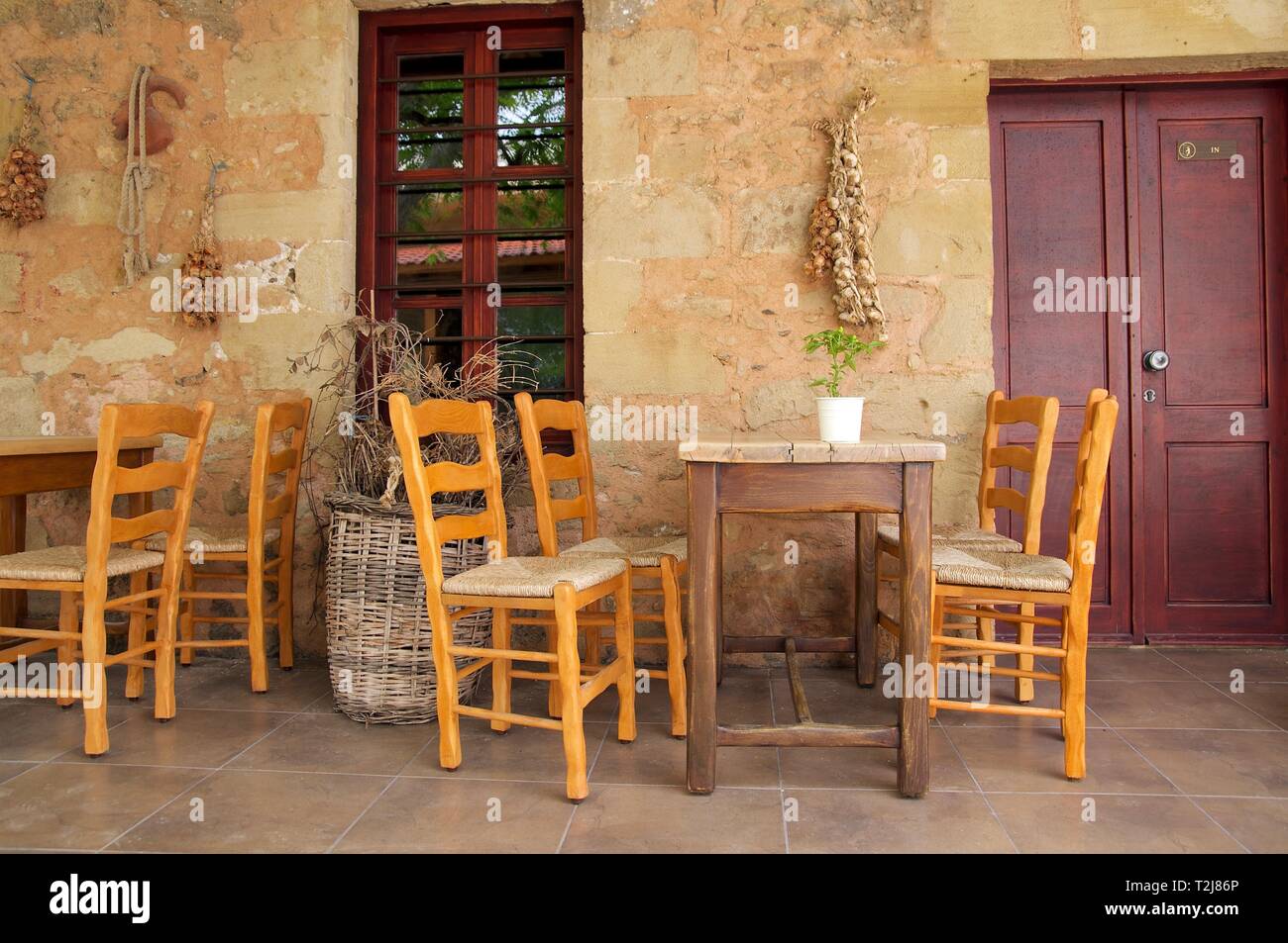 Traditional old tavern in Greece Stock Photo